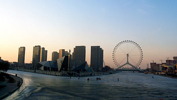giant ferris wheel on frozen river in tianjin china, winter, river, city, ferris wheel HD wallpaper