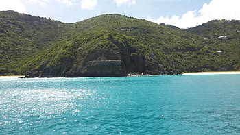 Bay side beauty, blue, sand, tropical, bay, beach, waves, trees, Island, water, ocean, sea, hills, mountain, rock, green, view, clouds, sky HD wallpaper