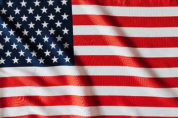Detailed close-up of the American flag showcasing vibrant colors and texture. HD wallpaper