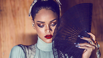 Rihanna, Dynamic performer, Evocative visuals, Electrifying presence HD wallpaper