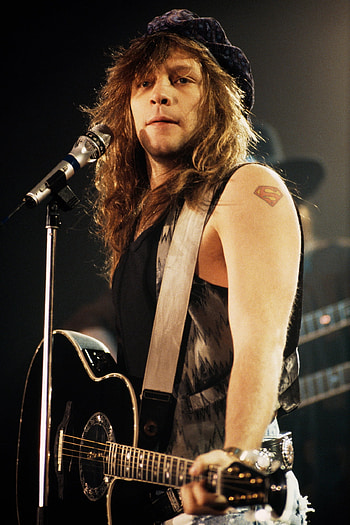 Jon Bon Jovi, White privilege discussion, Emotional lyrics, Realistic portrayal HD phone wallpaper