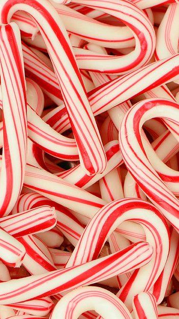 Colorful candy canes, Tasty holiday treat, Sweet peppermint delight, Festive decoration HD phone wallpaper