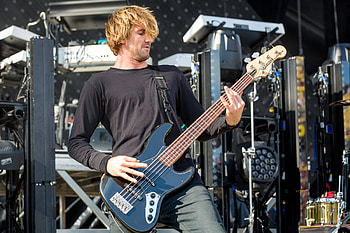 Parkway Drive bassist, Tour accident, Wheelchair-bound performance, Inspiring resilience HD wallpaper