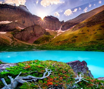 Cracker Lake Sunset, Montana, dead branches, beautiful, grass, rocks, lake, Glacier National Park, clouds, turquoise water, mountains, sunset HD wallpaper