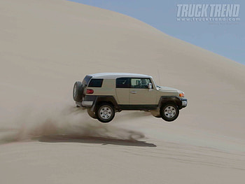 FJ Cruiser, sand, cruiser, toyota, desert, jump, suv, fj HD wallpaper