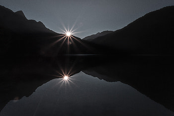Silhouette Of Mountain Near Body Of Water , silhouette, mountains, nature, reflection HD wallpaper