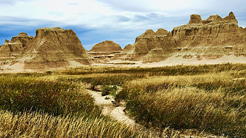 Overcast at Badlands National Park, South Dakota, creek, peaks, clouds, sky, rocks, usa HD wallpaper