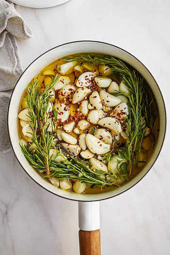 Garlic confit recipe, Flavorful dish, FoodByMaria creation, Cooking technique HD phone wallpaper