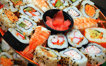 Fresh fish slices, Japanese delicacy, Culinary artistry, Sushi rolls HD wallpaper