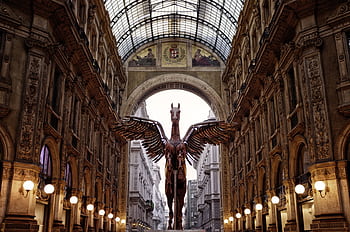 Stunning view of the Galleria Vittorio Emanuele II showcasing a Pegasus statue beneath the iconic skylight. HD wallpaper
