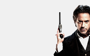 Robert Downey Jr., Dashing detective, Mysterious backdrop, Action-packed HD wallpaper