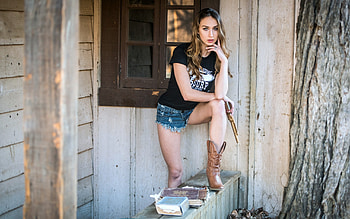 Cowgirl with Gun, model, cowgirl, brunette, gun, boots, shorts HD wallpaper
