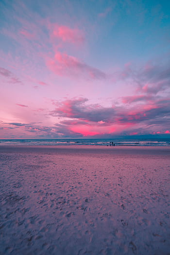 Scenic sunrise over Heringsdorf Beach with pastel skies and tranquil waves. HD phone wallpaper