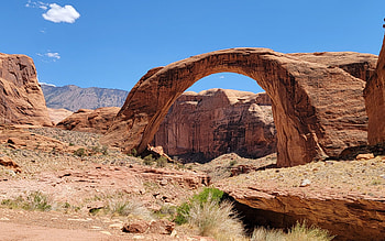 Rainbow Bridge on a nearly cloudless day in Utah, national park, arch, landscape, sky, rocks, usa HD wallpaper