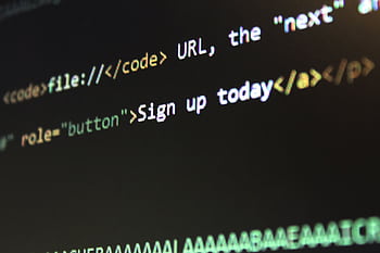 Detailed view of HTML and CSS code on a computer screen, concept of programming. HD wallpaper