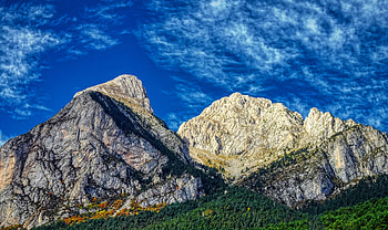 Majestic Stone Peaks Under Deep Blue Sky, stone, deep, blue, sky, clouds, mountains, mountain, tree, nature HD wallpaper