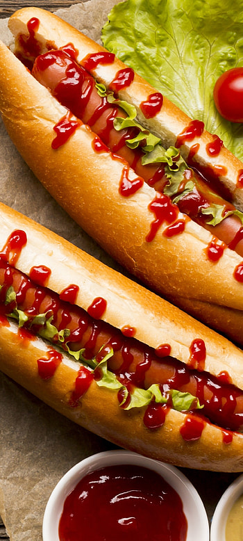 Satisfying snack, Street food delight, Hot dog craving, Fast food treat HD phone wallpaper