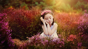Cute Little Girl With Closing Eyes Is Sitting In Purple Flowers Field Background Wearing White Dress Cute HD wallpaper