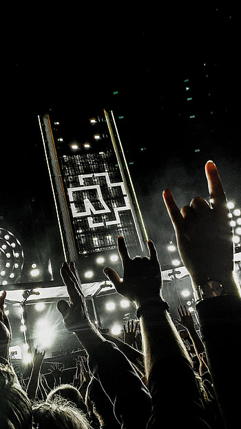Vibrant concerts, Rammstein fans, Epic stage presence, Enigmatic musicians HD phone wallpaper
