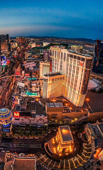 Las Vegas skyline, Vibrant lights, Iconic landmarks, City of entertainment HD phone wallpaper