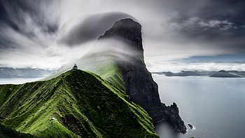 Coastal beauty, Lighthouse marvel, Mountainous backdrop, Cliffside wonder HD wallpaper