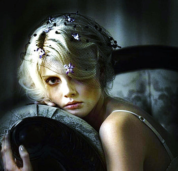 Solitude, chair, blond, flowers in hair, woman, serious sad look HD wallpaper