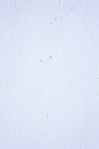 of a textured white wall with subtle imperfections, ideal for backgrounds. HD phone wallpaper