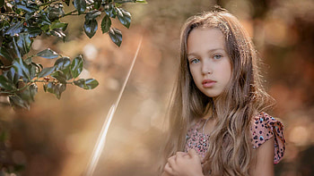 Cute Little Girl Is Standing In Blur Bokeh Background Wearing Light Peach Color Dress Cute HD wallpaper