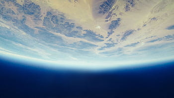 Stunning aerial view of Earth from space showing continents and oceans. HD wallpaper