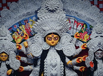 Intricate idol of Goddess Durga showcased during the vibrant Durga Puja festival in Kolkata. HD wallpaper