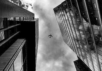 Plane Between Two Buildings Monochrome, plane, building, graphy, monochrome, black-and-white, flickr HD wallpaper