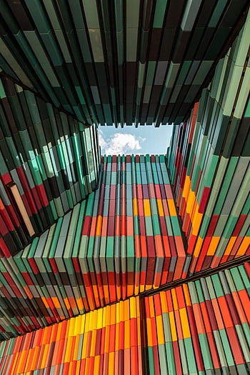 Colorful geometric architectural structure in Melbourne featuring vibrant patterns and modern design. HD phone wallpaper