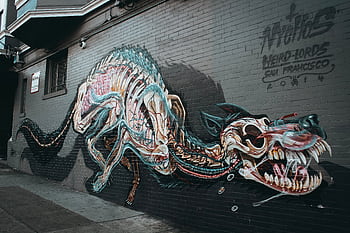 Colorful street art mural depicting a dragon on a San Francisco building exterior. HD wallpaper