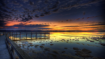 pier at sunset r, sea, shore, pier, r, rocks, sunset HD wallpaper