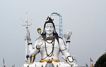 Impressive statue of Lord Shiva against a clear sky in Gangtok, Sikkim, India. HD wallpaper