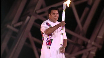 Muhammad Ali holding the Olympic torch during the 1996 games in Atlanta. HD wallpaper