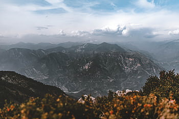 Breathtaking view of Revest-les-Roches mountains under dramatic skies in Provence, France. HD wallpaper