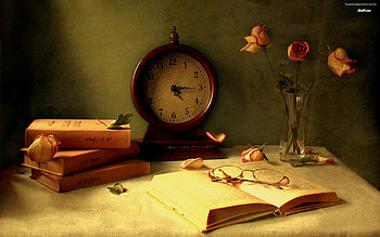 Books and a old watch on the table HD wallpaper