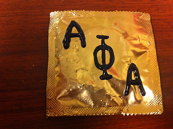 DIY Alpha Phi Alpha condoms! Simply spray paint gold condoms and use black puffy paint HD wallpaper