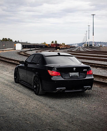 BMW E60 M5 1080×1329 HD phone wallpaper