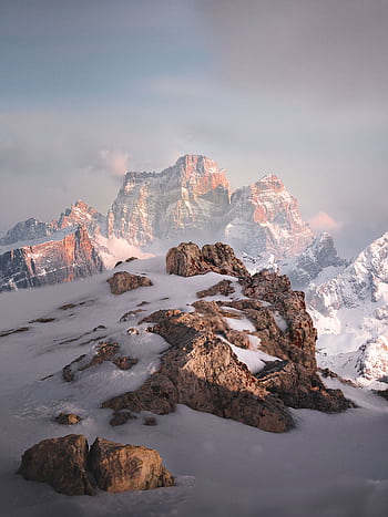 Breathtaking view of snow-covered Monte Pelmo in the Dolomites, capturing winter's serene beauty. HD phone wallpaper