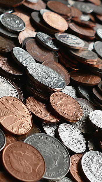 Close-up of various international coins in a pile, showcasing different currencies and designs. HD phone wallpaper