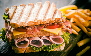 Delicious ham sandwich, Fast food favorite, Double sandwich delight, Savory fries HD wallpaper