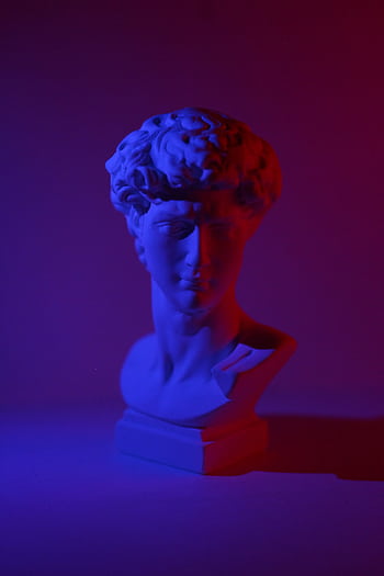 Neoclassical marble bust highlighted by vibrant blue and red neon lighting. HD phone wallpaper