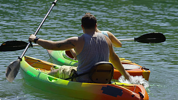 Couple kayaking, in lake, Stock video HD wallpaper