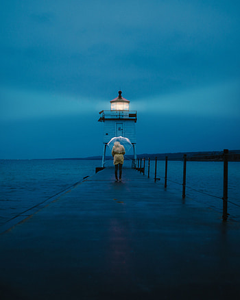 Sea, Twilight, Pier, Miscellanea, Miscellaneous, Dusk, Lighthouse, Human, Person, Umbrella HD phone wallpaper