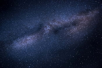 A breathtaking capturing the Milky Way galaxy against a dark, starry night sky. HD wallpaper
