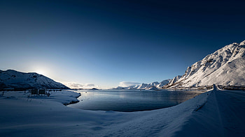 Arctic Fjord Surrounded By Snow Capped Peaks, snow, ice, lake, mountains, mountain, sky, blue, nature HD wallpaper