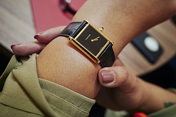 Black dial Cartier Tank, Yellow gold, Timeless design, Luxury timepiece HD wallpaper