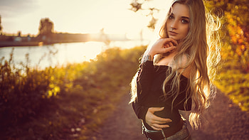 Girl Model Is Wearing Black Top And Blue Jeans Standing On Road In Sunlight Background Girls HD wallpaper